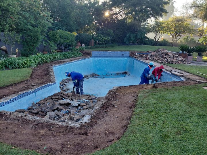 Our team resizing a pool during a renovation