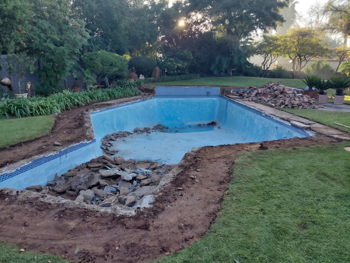 The same pool during demolition, before